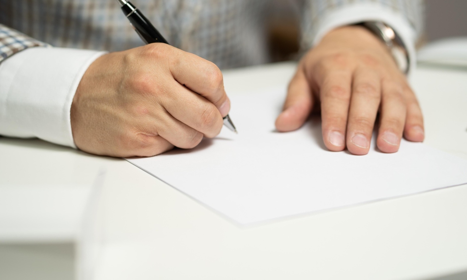 A healthcare professional preparing patient information at Foot & Ankle Center of Arizona, ensuring quality care.
